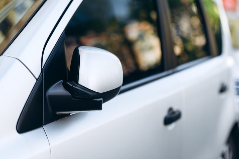 White car with windows are tinted