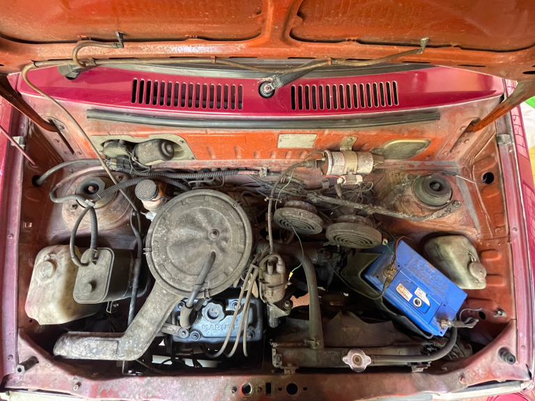 Dusty Engine Bay Of Old Car